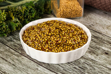 Mustard sauce with seeds in the bowl