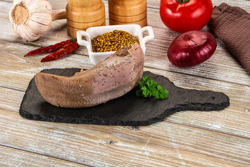 Steamed pork tongue with mustard