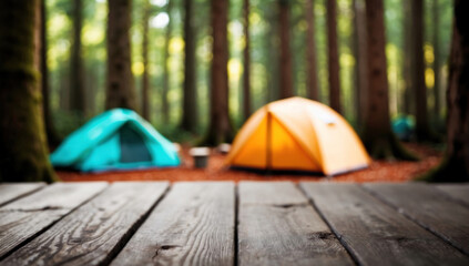 Wood tabletop backdrop. Blurry camping scene. Tent, forest, outdoor adventure.
