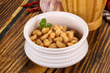 Baked white canned beans in the bowl