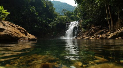 Naklejka premium Cascading waterfall adventure lush forest setting nature photography tranquil environment ground-level perspective