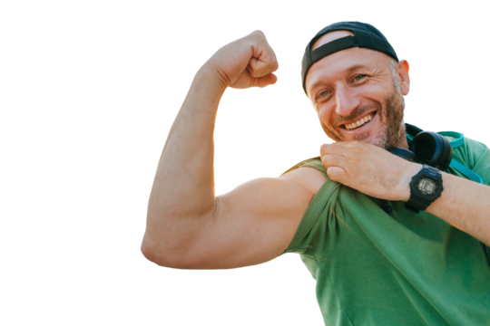 A smiling person in a red shirt rests on a stone bench, chatting on the phone, embodying relaxed urban leisure.