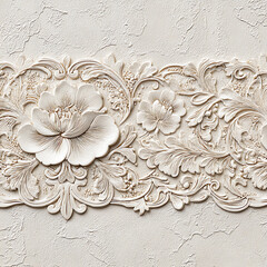 A white wall with a floral design