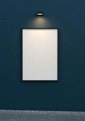 Photo of a blank framed poster hangs on a dark blue textured wall under a light