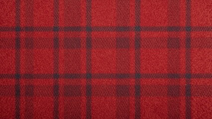 Pattern of red black plaid fabric close-up texture warm cozy material