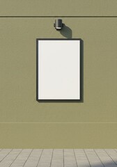 Photo of a blank poster frame hangs on a textured green wall with a lamp above it