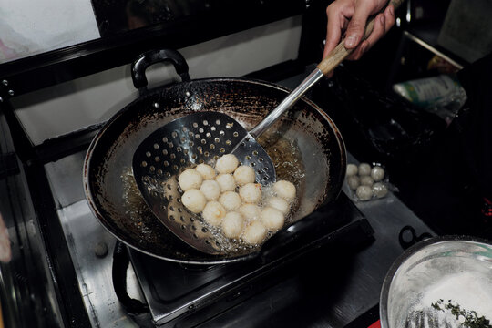 Round cimol, a traditional Sundanese snack, being cooked and  will be seasoned for a modern twist! A delicious street food favorite.