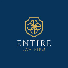 Elegant gold letter E law firm logo inside a shield, with classic serif typography and blue background, perfect for legal, notary, or corporate branding.