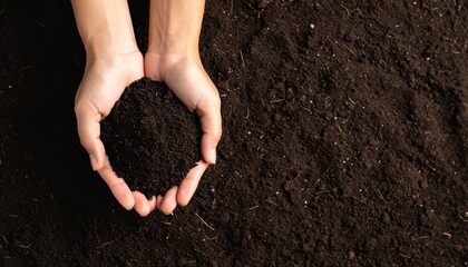 Close-up farmer holding soil in hands agricultural field nature photography outdoor environment aerial view soil health awareness