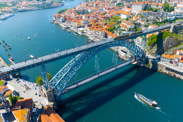 Famous bridge Ponte dom Luis above old town of Porto at river Duoro, Portugal