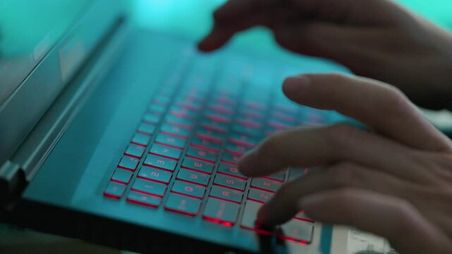 Man Writing Code On Laptop