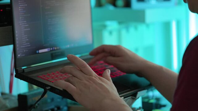 Man Writing Code On Laptop