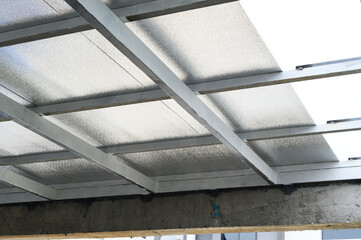 Metal structure supports insulated sheet panel containing pu foam, suggesting reliable construction...