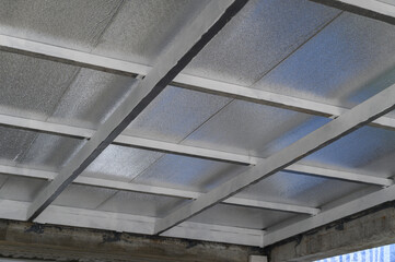 Installing building material ceiling structure featuring lightweight insulation panels using metal...