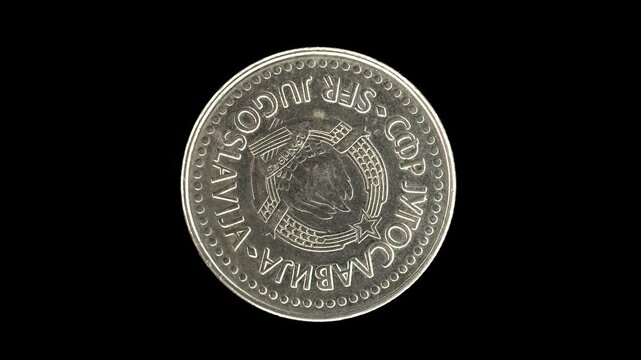 Yugoslavia 1987 100 dinara coin obverse with state emblem of six torches and star rotating on black background