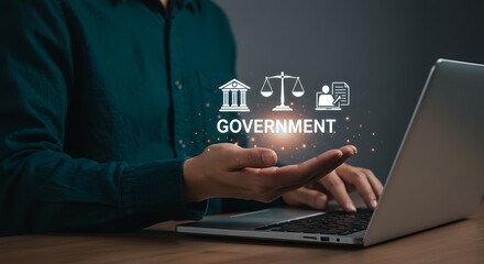Person holding government icons and working on laptop digital interface justice document