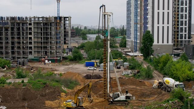Real time drilling rig performing foundation work at residential construction