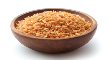 Fototapeta premium Photograph of uncooked bulgur wheat in a dark wooden bowl against a white background.