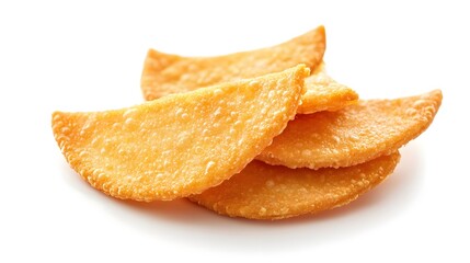Photograph of crispy golden-brown wonton triangles stacked on a white surface.