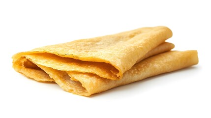 Photograph of stacked crepes, golden brown and slightly textured, resting on a white surface.