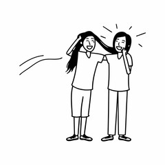 Funny best friends laughing cheerfully while standing together in a studio