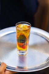 Mint Cocktail with Ice Served on Silver Tray