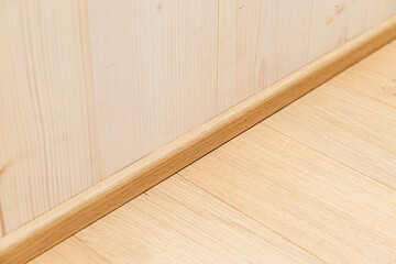 Interior Floor and Wall Corner With Wood Skirting