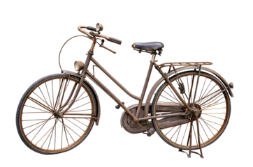 Fototapete Vintage rusty bicycle with metal frame and leather seat isolated on black background image © Tanjil