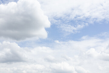 Bright Blue Sky With Fluffy Clouds