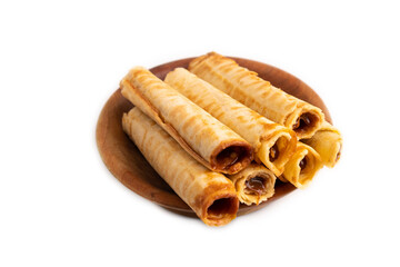 Waffles with caramel isolated on white, side view, close up