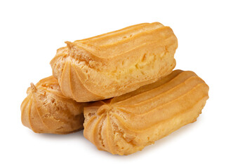 Pile of eclairs close-up on a white background. Isolated