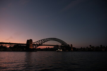Sydney, Australia - August 10th 2024 - The iconic Sydney Harbour Bridge. Perfect for travel brochures, website headers, or evoking Australian wanderlust.