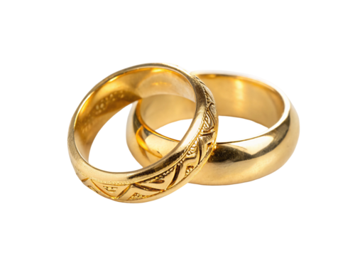 Elegant gold wedding bands symbolizing love and commitment on classic black background design