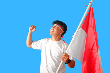 Proud Young Man Holding National Flag, Celebrating Patriotism