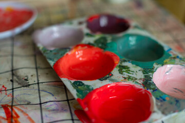 Childrens kids crafts palette colour paint mixing colourful hands