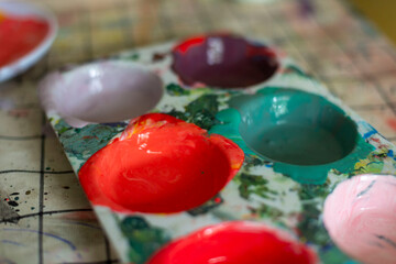Childrens kids crafts palette colour paint mixing colourful hands