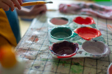 Childrens kids crafts palette colour paint mixing colourful hands