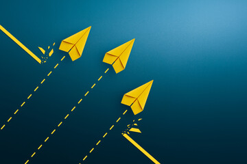Group of paper planes breaking through obstacle. Concept of overcoming barriers, goal, target