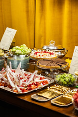 Luxury Dessert Buffet Setup Under Elegant Hanging Lights
