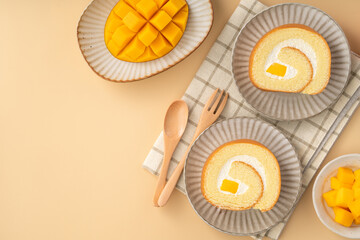 Delicious mango cream Swiss roll cake on plate