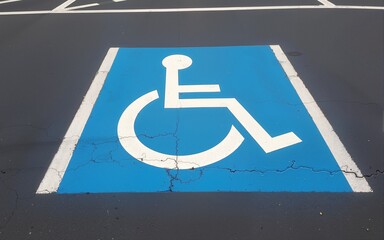 handicapped parking bay on asphalt background texture. High quality