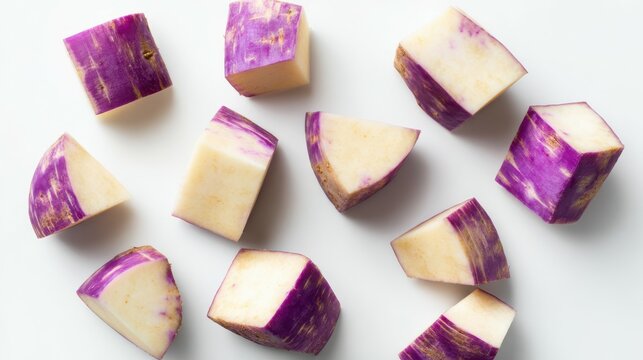 Cut Purple Top Turnips Fresh Vegetable Pieces on White Background, Top View