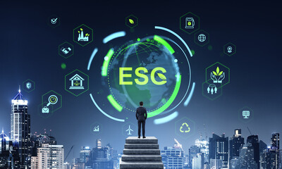 Businessman looking at ESG digital interface with sustainability