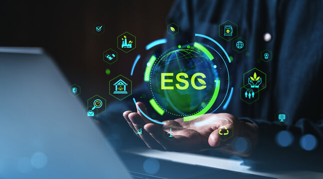 ESG concept with digital sustainability icons hovering above hands near laptop in futuristic eco-technology business interface scene on dark background.