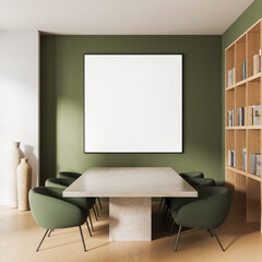 Modern interior with blank poster mockup on green wall above stone table surrounded by green chairs in minimalist meeting room with bookshelf decor. 3D Rendering