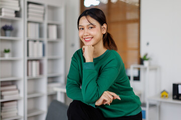 Portrait of Smiling confident stylish young asian woman standing at office. lady executive business...