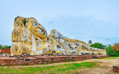 The giant statue of Reclining Buddha, Wat Lokaya Sutha in Ayutthaya, Thailand