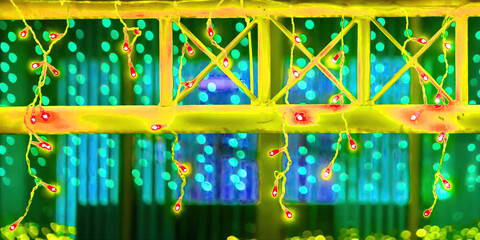 Colorful decorative lights create a vibrant atmosphere in an indoor setting during a festive event in the evening