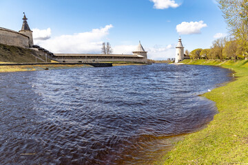 Panoramic view of Pskova River mouth merging with Velikaya River, flanked by ancient Pskov Kremlin...