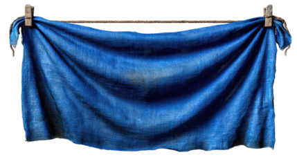 Washed Blue Cloth Hanging: An artistic shot captures a vibrant blue cloth, gently billowing as it hangs from a clothesline, its texture and form illuminated in natural light.